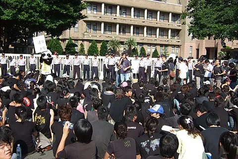 sit-in: a peaceful form of protest in which people occupy an area and refuse to leave