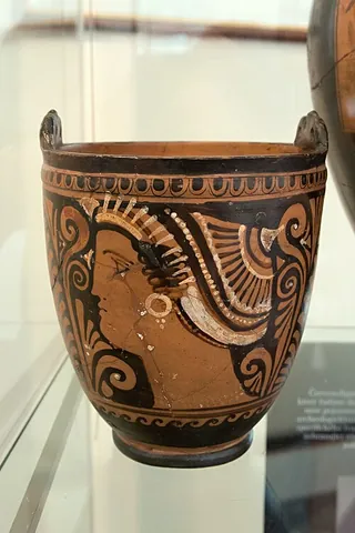 situla: a deep ceramic vase with a wide opening