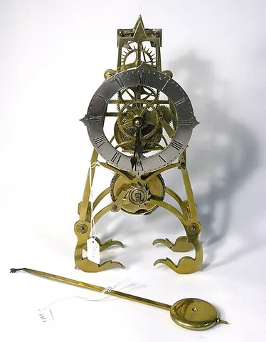 skeleton clock: a clock style in which the clockwork is visible