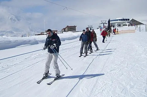 ski tow: a type of ski lift that tows skiers along the ground