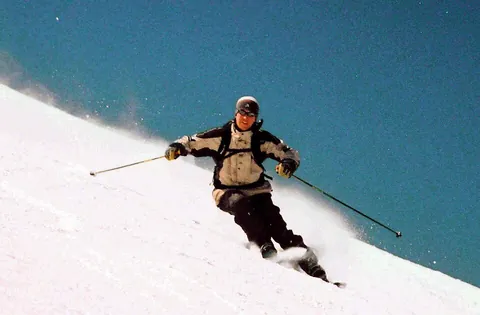 ski: one of a pair of long flat runners designed for gliding over snow or water