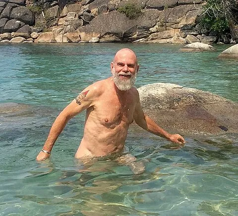 skinny dipping: swimming in the nude, as opposed to with a swimsuit