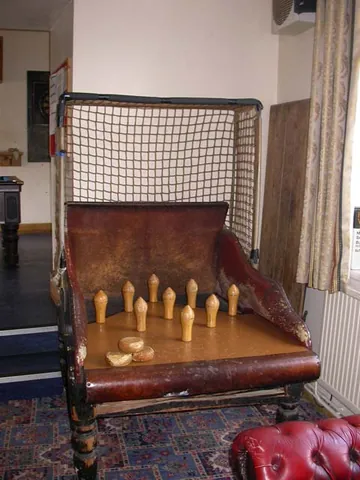 skittle: one of the wooden targets used in skittles