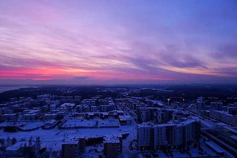 sky-blue pink: a color of the sky at sunrise or sunset, with patches of blue and pink, or a gradient between them
