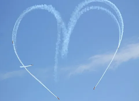 skywriting: messages, left by leaving a trail of smoke from an airplane, that are visible from the ground