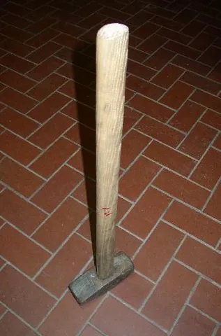 sledgehammer: a hammer that consists of a large, heavy, broad and flat block of metal (the head) attached to a...