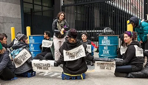 sleeping dragon: a tube-shaped device that protesters attach their hands to on the inside, particularly in order to...