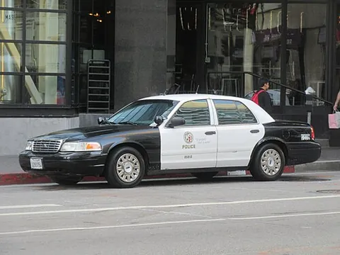slicktop: a police car with painted markings and decals but no external rooftop lights