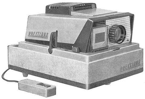 slide projector: a device that projects an enlarged image of a photographic slide onto a screen