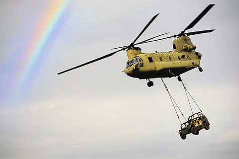 slingload: a load suspended from an aircraft, usually a helicopter, and carried to a new location