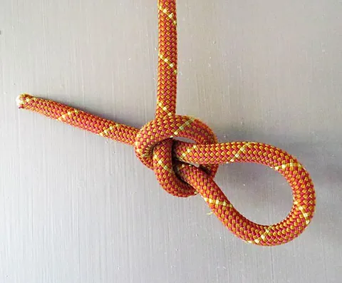 slip knot: a knot which attaches a line to an object and tightens when pressure is applied