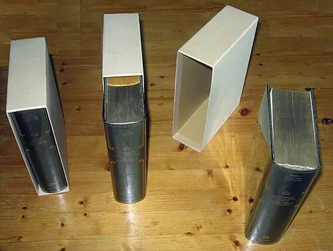 slipcase: a box, open on one end, for keeping a set of books together