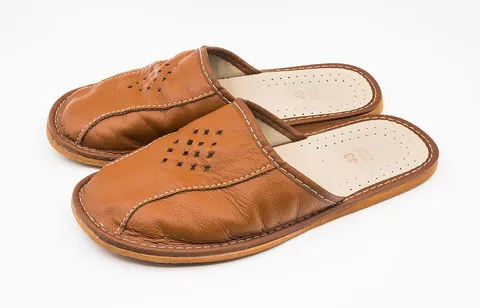 slipper: a low soft shoe that can be slipped on and off easily