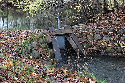 sluice gate: a portal which may be opened or closed to allow or prevent the passage of water through a man-made...