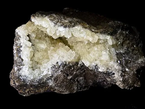smithsonite: a mineral form of zinc carbonate, ZnCO₃, mined as an ore of zinc or as an ornamental stone