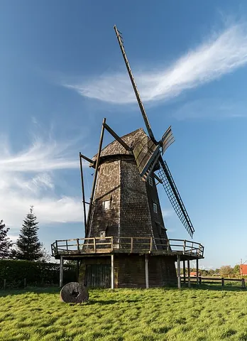 smock mill: a windmill of which only the cap turns round to meet the wind. It is different from a post mill,...