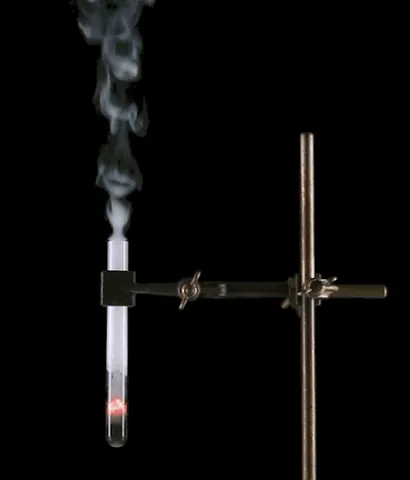 smoke: the visible vapor/vapour, gases, and fine particles given off by burning or smoldering material