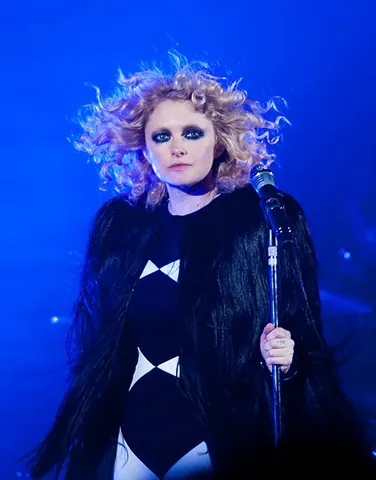 smoky eyes: eyes with a shadowy gradient or dark rings around them, created by the application of black or dark...