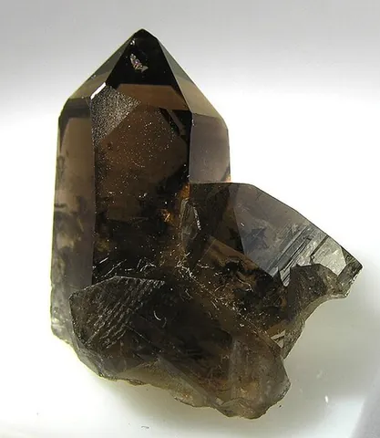 smoky quartz: a brown to black variety of quartz
