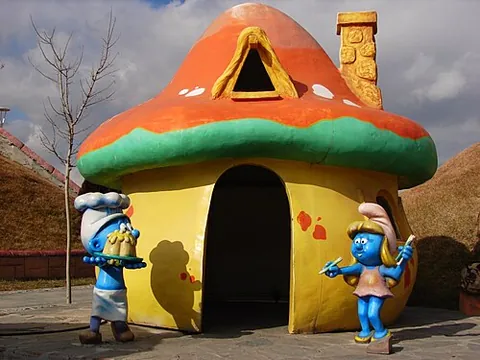 smurf: a blue pixie with a white stocking cap, from the media franchise The Smurfs