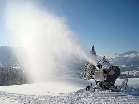 snow cannon: a machine that spurts out snow over pistes where there is little or no snow cover