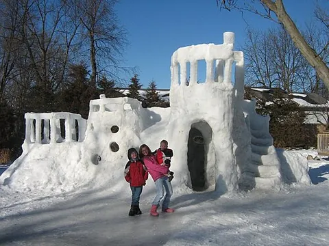 snow fort: a walled structure constructed of snow and used for children's wintertime play