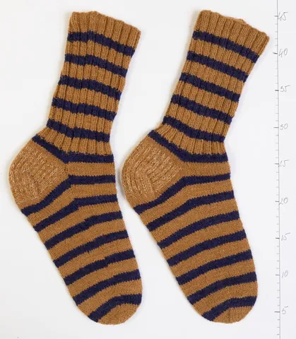 sock: a knitted or woven covering for the foot