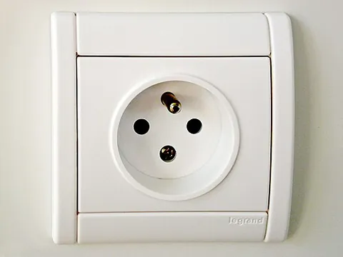 socket: an opening into which a plug or other connecting part is designed to fit (e.g. a light bulb socket)