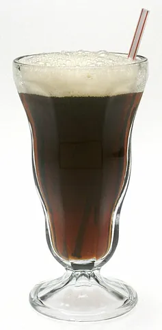 soda glass: the glass in which drinks are served in a soda fountain