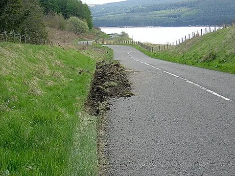 soft-verge: an unsealed strip along the edge of a sealed road