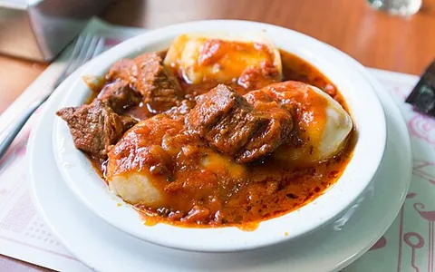 sorrentinos: a Argentinian dish similar to ravioli, but larger, more circular and originally wrapped without...