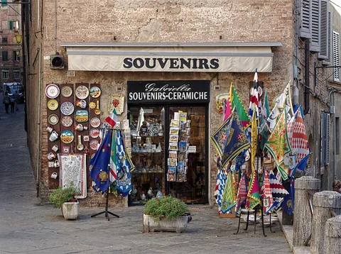souvenir: an item of sentimental value, that is given or kept to remember an event or location