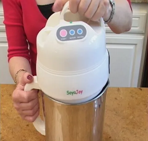 soy milk maker: a kitchen appliance that cooks soy milk from raw soy beans