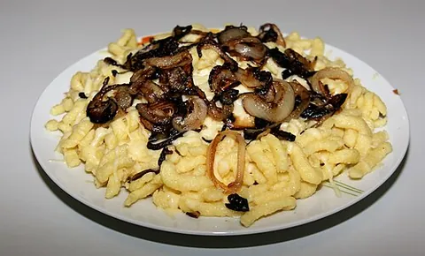spaetzle: a heavy egg noodle or dumpling used in the cuisine of southern Germany and Austria