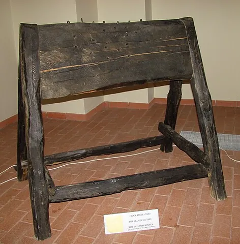 spanish donkey: a torture device consisting of a very narrow vertical surface where the victim is made to sit with...