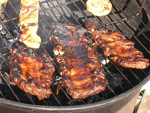 sparerib: a cut of meat including the rib bones