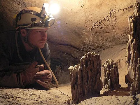 speleologist: a person who studies or explores caves or studies the science of speleology