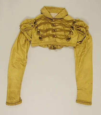 spencer: a short double-breasted men's overcoat worn in the 18th and 19th centuries
