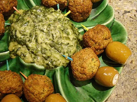 spinach dip: a common restaurant appetizer made from spinach and another ingredient such as mayonnaise, cream...