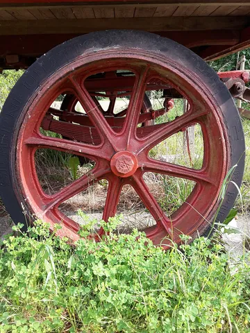 spoke: a support structure that connects the axle or the hub of a wheel to the rim