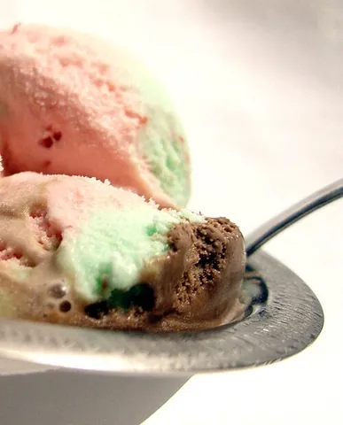 spumoni: an Italian style of ice cream dessert made with layers of different colors and flavors (typically...
