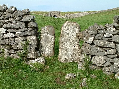 squeeze stile: a stile formed by two uprights close enough together to allow a person to squeeze through but too...