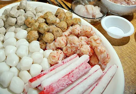 squidball: a food item made from pulverized squid shaped into a ball, popular in Chinese cuisine and elsewhere...