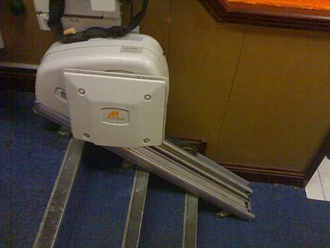 stairlift: a motorized platform installed in a stairway, which traverses the stairs when activated and can be...