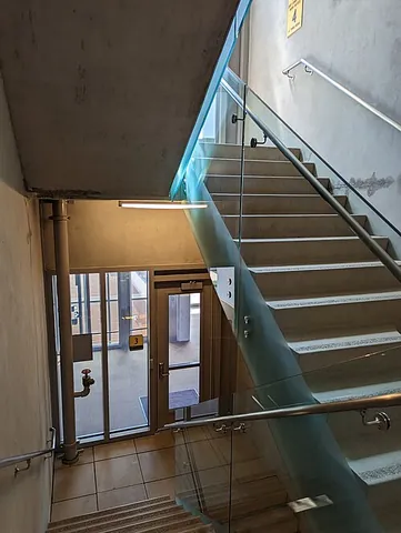 stairwell: a shaft in a multi-story building enclosing a stairway or staircase