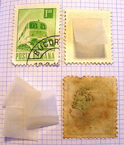 stamp hinge: a small gummed strip of folded glassine paper, used to mount stamps on an album page