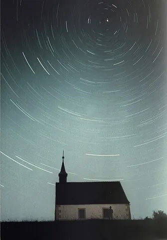 star trail: the line of light recorded on a photographic medium when a time exposure is made of a star in the...