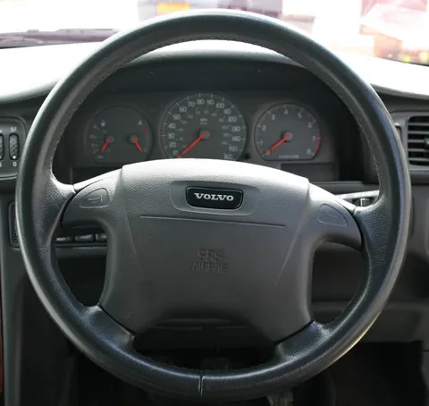 steering wheel: a wheel-shaped control that is rotated by the driver to steer, existing in most modern land vehicles