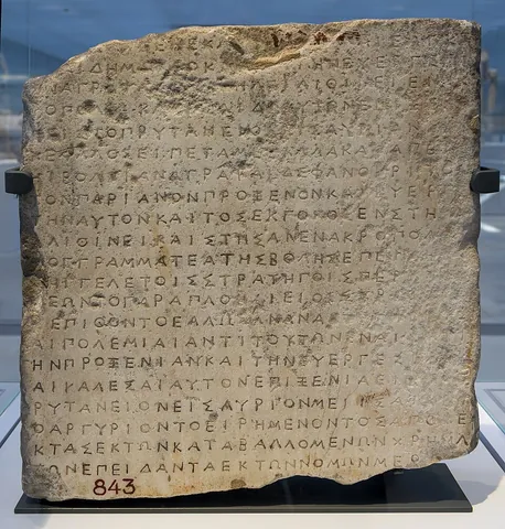 stele: an upright (or formerly upright) slab containing engraved or painted decorations or inscriptions; a...
