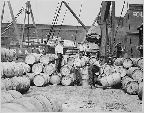 stevedore: a dockworker involved in loading and unloading cargo, or in supervising such work